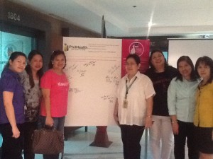 ICanServe volunteers deliver the Pink Positive Pledge Wall to PhilHealth, a staunch partner for early breast cancer detection. (September 30, 2013)