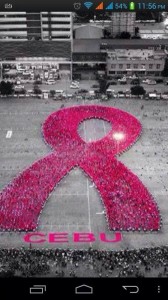 6,671 participants form a pink ribbon, the international symbol for breast cancer awareness (Facebook grab from Veronica Israel Enriquez